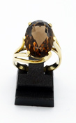 gouden ring met ovale edelsteen rookkwarts in facet slijpsel